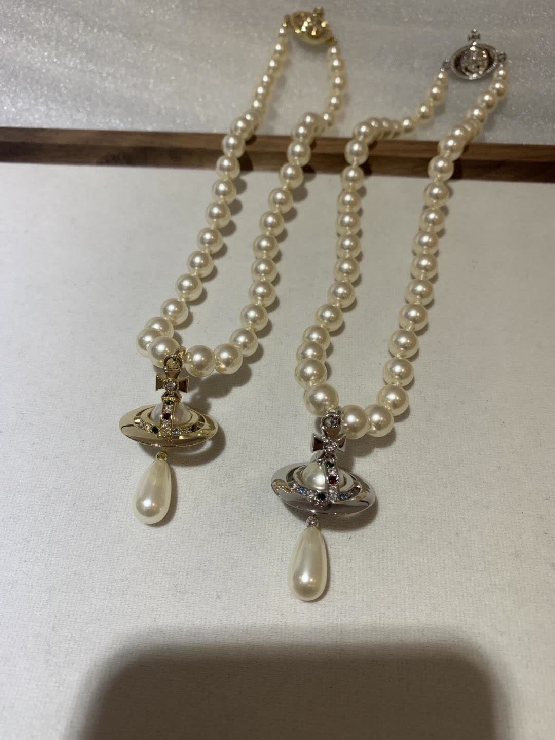 Vivienne Westwood Elegant Pearl Necklace with Pendant